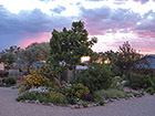 Sunset over well house